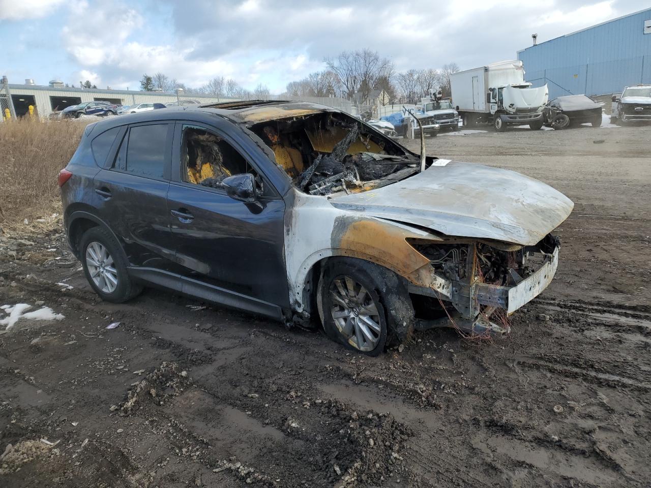 2015 Mazda CX-5 VIN JM3KE4CY9F0479814 Copart auction photo, burn - engine / burn - interior damage thumbnail 4