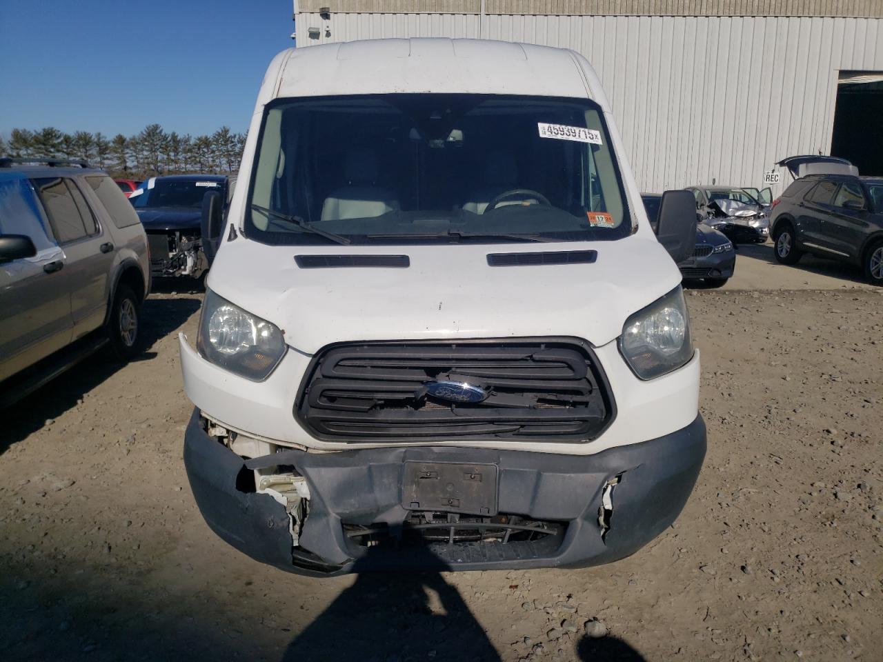 2016 Ford Transit VIN 1FTYR1CM6GKA05473 Copart auction photo, front end / minor dent/scratches damage thumbnail 5