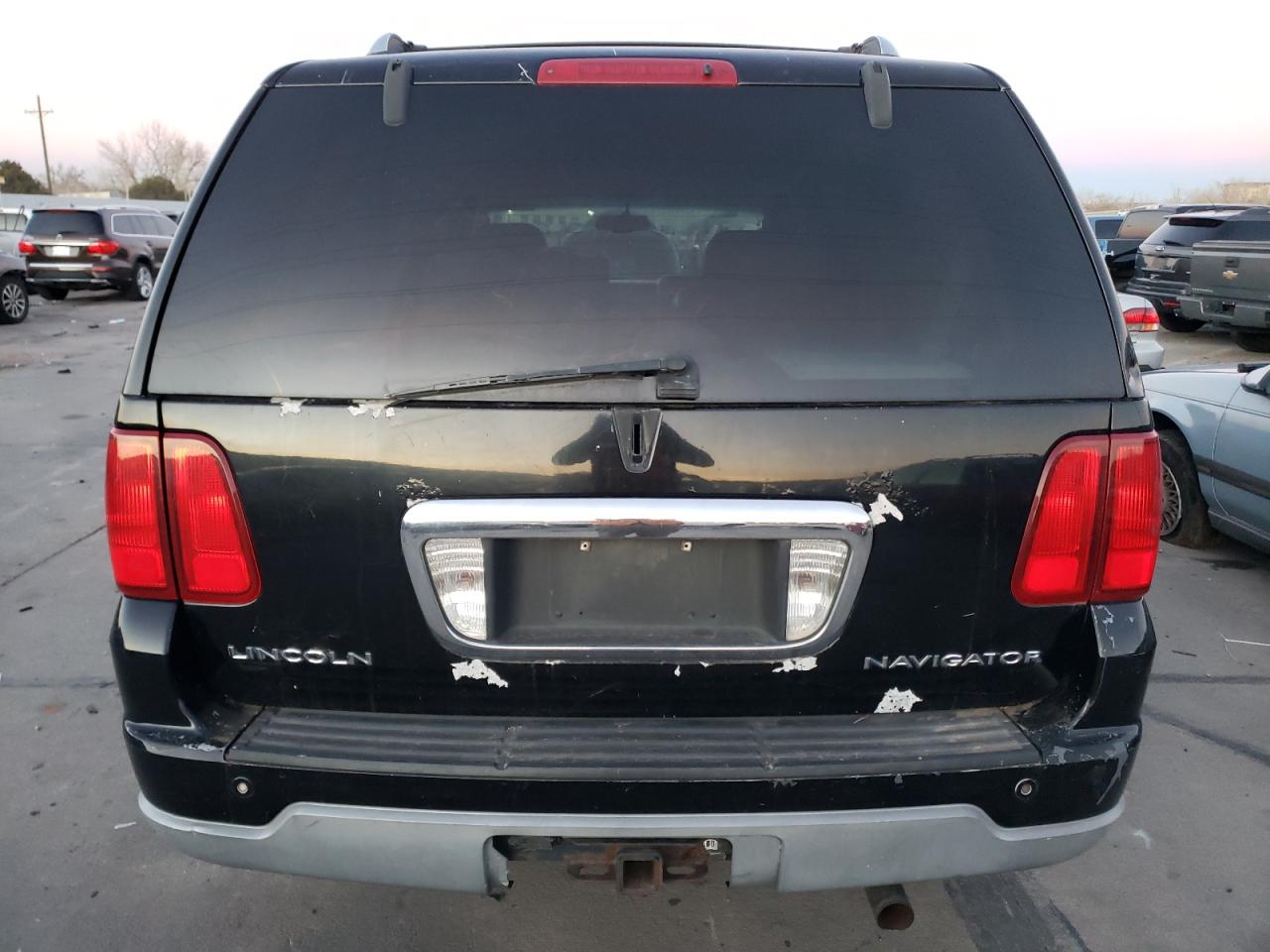 2003 Lincoln Navigator VIN 5LMFU28R23LJ03042 Copart auction photo, front end / hail damage thumbnail 6