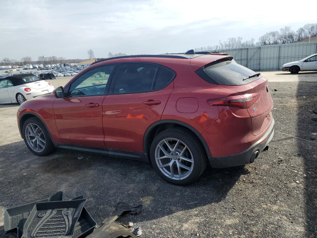 2018 Alfa Romeo Stelvio VIN ZASFAKNN4J7B75102 Copart auction photo, undercarriage / minor dent/scratches damage thumbnail 2