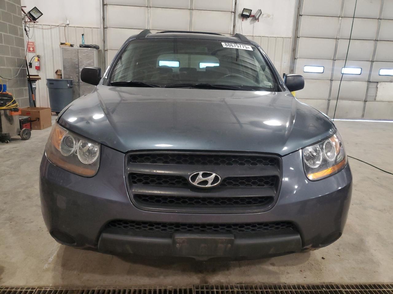 2009 Hyundai Santa Fe VIN 5NMSG73D89H317775 Copart auction photo, front end / undercarriage damage thumbnail 5