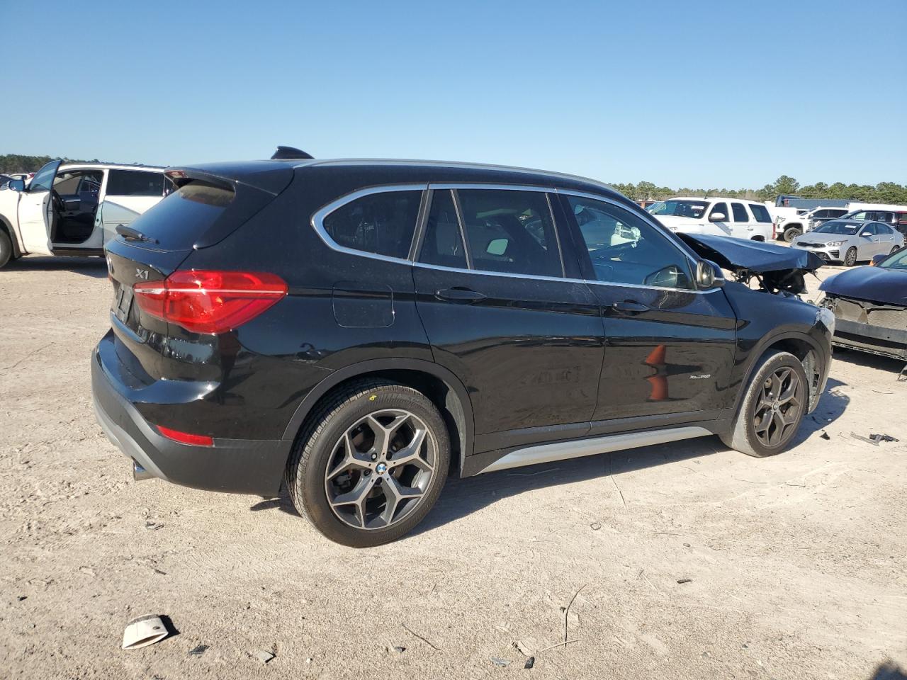2018 BMW X1 VIN WBXHT3C3XJ5K21808 Copart auction photo, front end / minor dent/scratches damage thumbnail 3