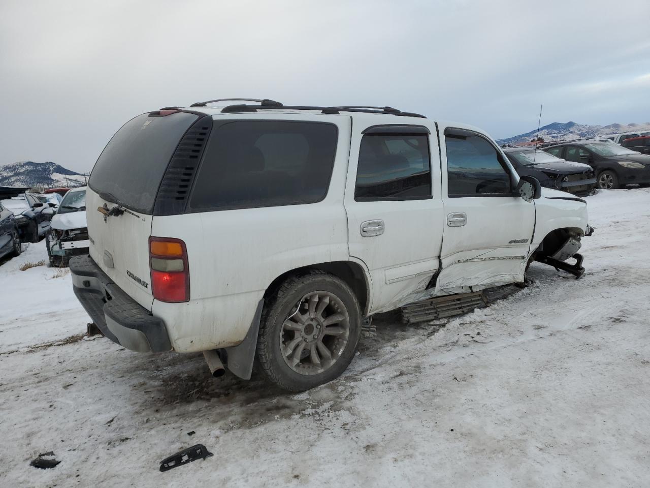2003 Chevrolet Tahoe VIN 1GNEK13Z53J323823 Copart auction photo, undercarriage / all over damage thumbnail 3
