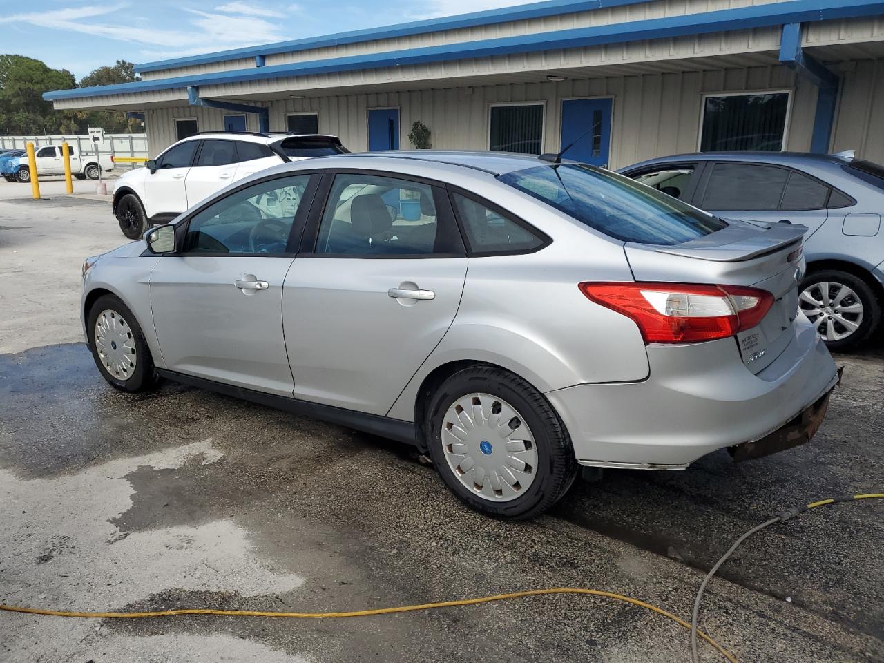 2012 Ford Focus VIN 1FAHP3F26CL166203 Copart auction photo, rear end / minor dent/scratches damage thumbnail 2
