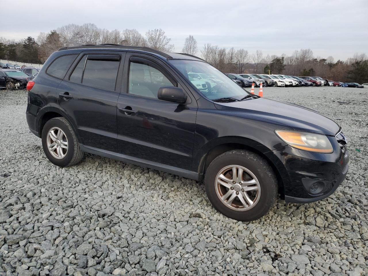 2011 Hyundai Santa Fe VIN 5XYZG4AG9BG056988 Copart auction photo, front end / minor dent/scratches damage thumbnail 4