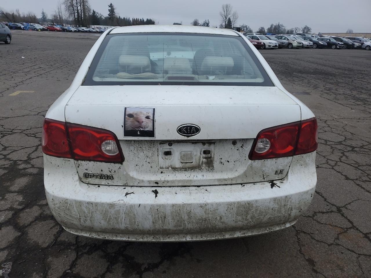 2007 KIA Optima VIN KNAGE123375096231 Copart auction photo, all over damage thumbnail 6
