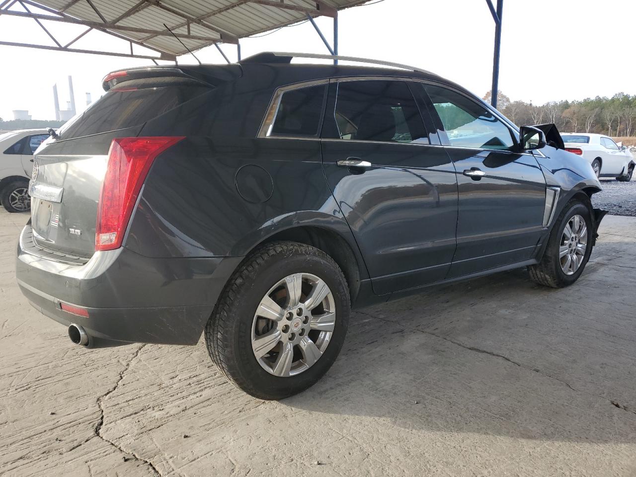 2015 Cadillac SRX VIN 3GYFNBE31FS615968 Copart auction photo, all over damage thumbnail 3