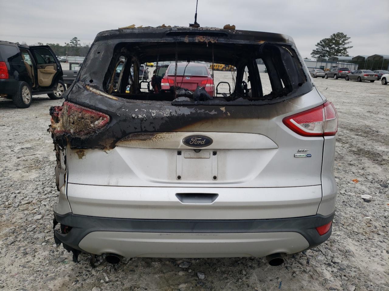 2014 Ford Escape VIN 1FMCU9GX3EUC60624 Copart auction photo, burn damage thumbnail 6