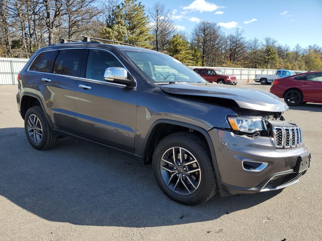 2019 Jeep Grand Cherokee VIN 1C4RJFBGXKC815714 Copart auction photo, front end / side damage thumbnail 4