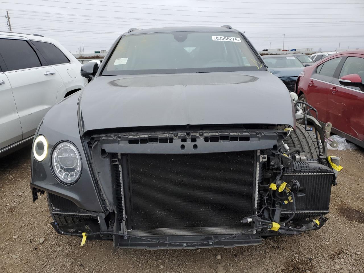 2019 Bentley Bentayga VIN SJAAM2ZV3KC027120 Copart auction photo, front end / side damage thumbnail 5