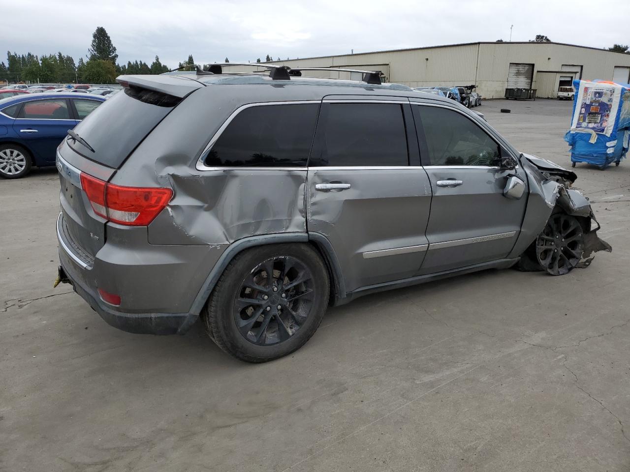 2012 Jeep Grand Cherokee VIN 1C4RJFCT7CC240632 Copart auction photo, front end / side damage thumbnail 3