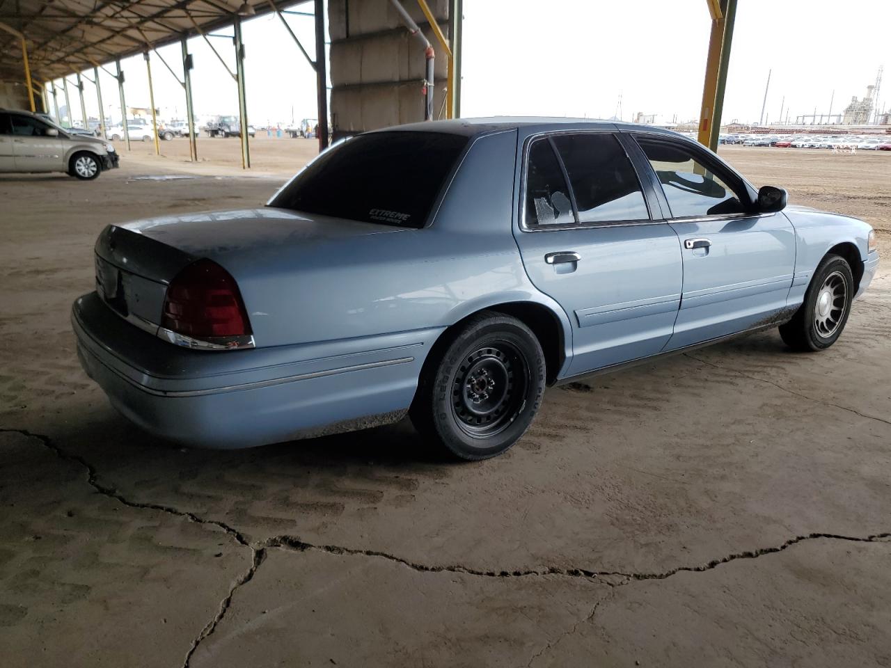 1999 Ford Crown Victoria VIN 2FAFP74W2XX159035 Copart auction photo, side / front end damage thumbnail 3