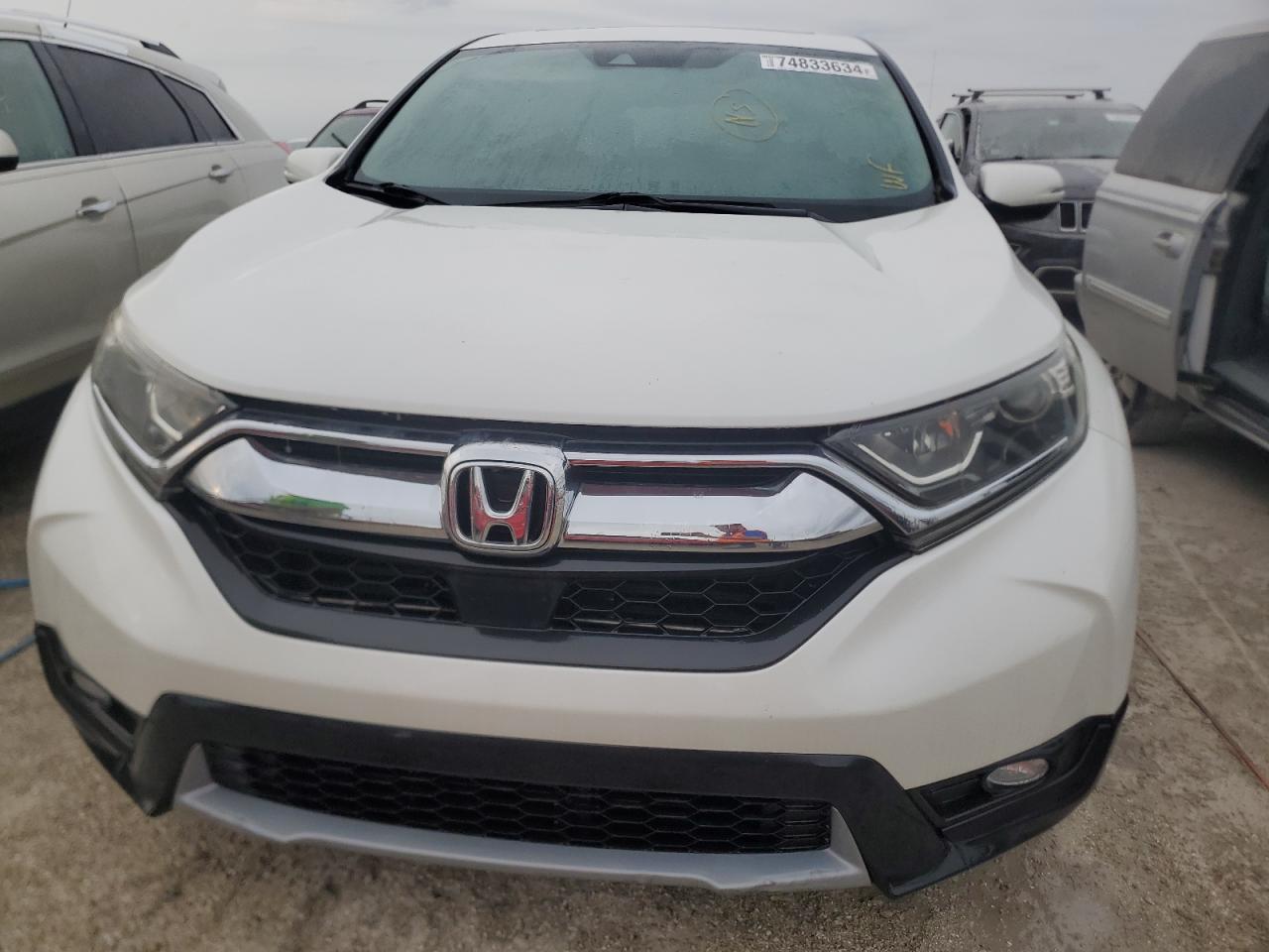 2018 Honda CR-V VIN 5J6RW1H87JL007897 Copart auction photo, water/flood damage thumbnail 5