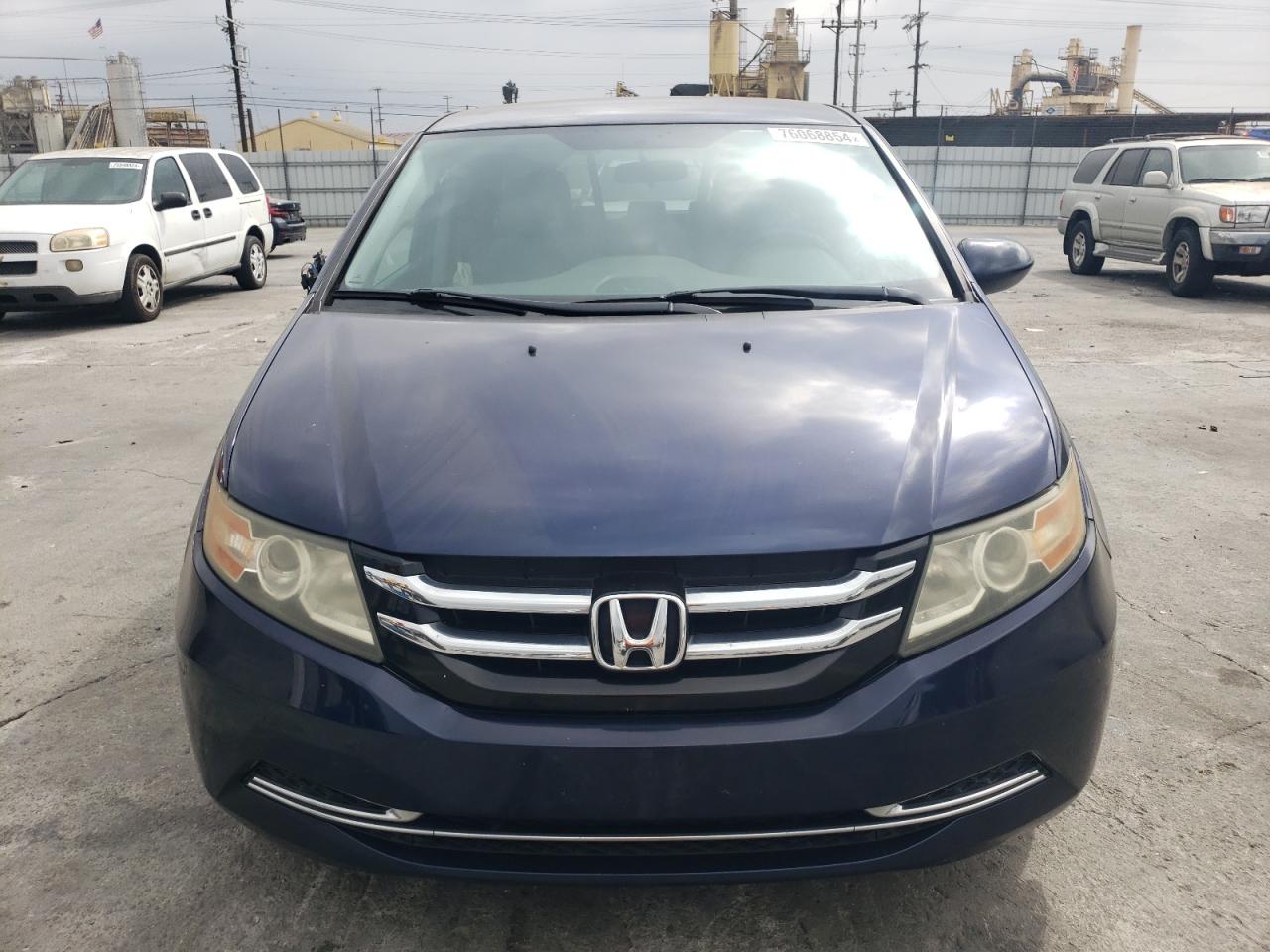 2016 Honda Odyssey VIN 5FNRL5H3XGB018964 Copart auction photo, side / rear end damage thumbnail 5