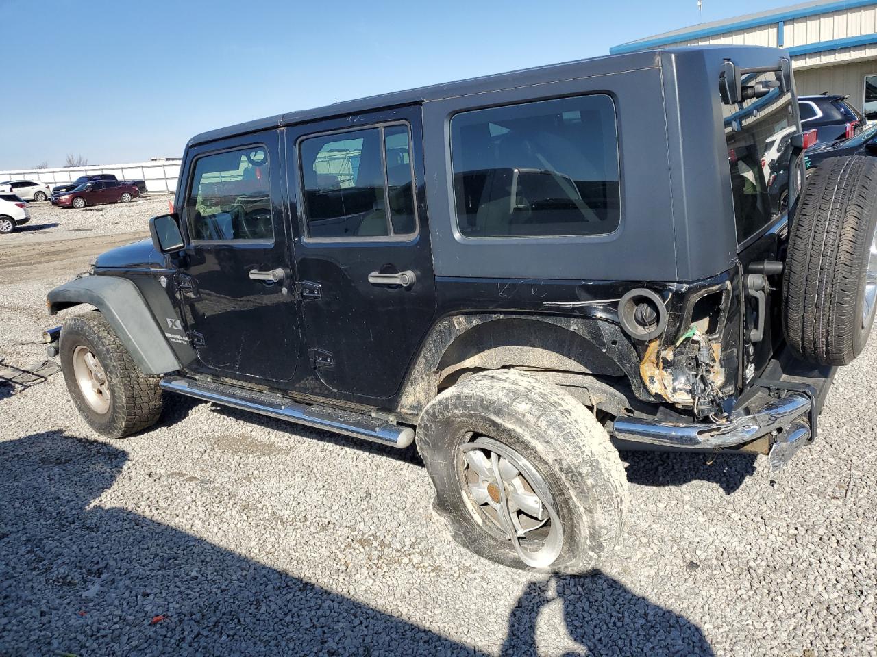 2009 Jeep Wrangler VIN 1J4GA39199L733727 Copart auction photo, rear end damage thumbnail 2