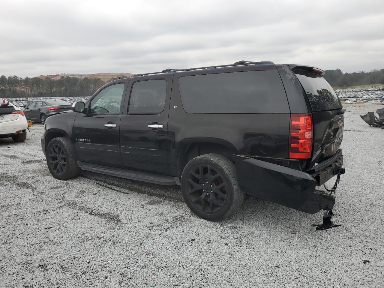 2010 Chevrolet Suburban VIN 1GNUCJE06AR228967 Copart auction photo, front end / rear end damage thumbnail 2