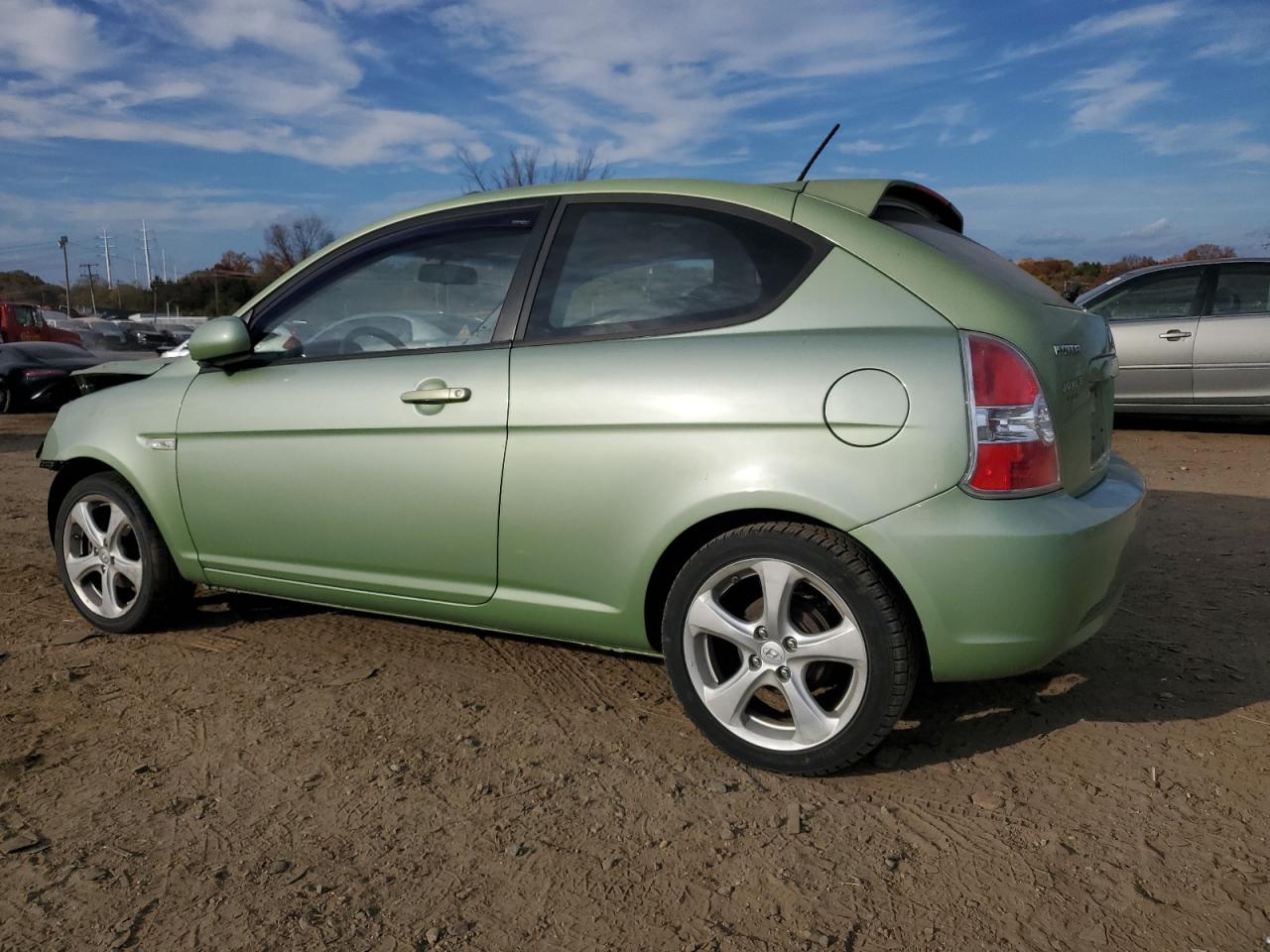 2010 Hyundai Accent VIN KMHCN3AC8AU180133 Copart auction photo, front end / minor dent/scratches damage thumbnail 2