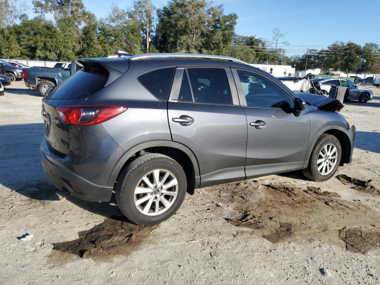 2016 Mazda CX-5 VIN JM3KE2CY1G0782592 Copart auction photo, front end / minor dent/scratches damage thumbnail 3