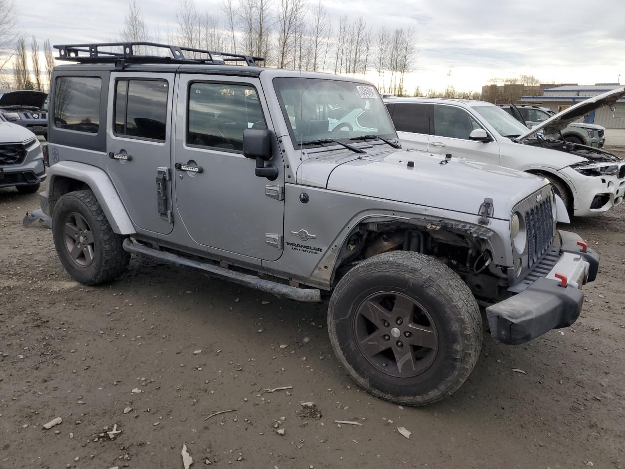 2013 Jeep Wrangler VIN 1C4BJWDG2DL628713 Copart auction photo, undercarriage / front end damage thumbnail 4