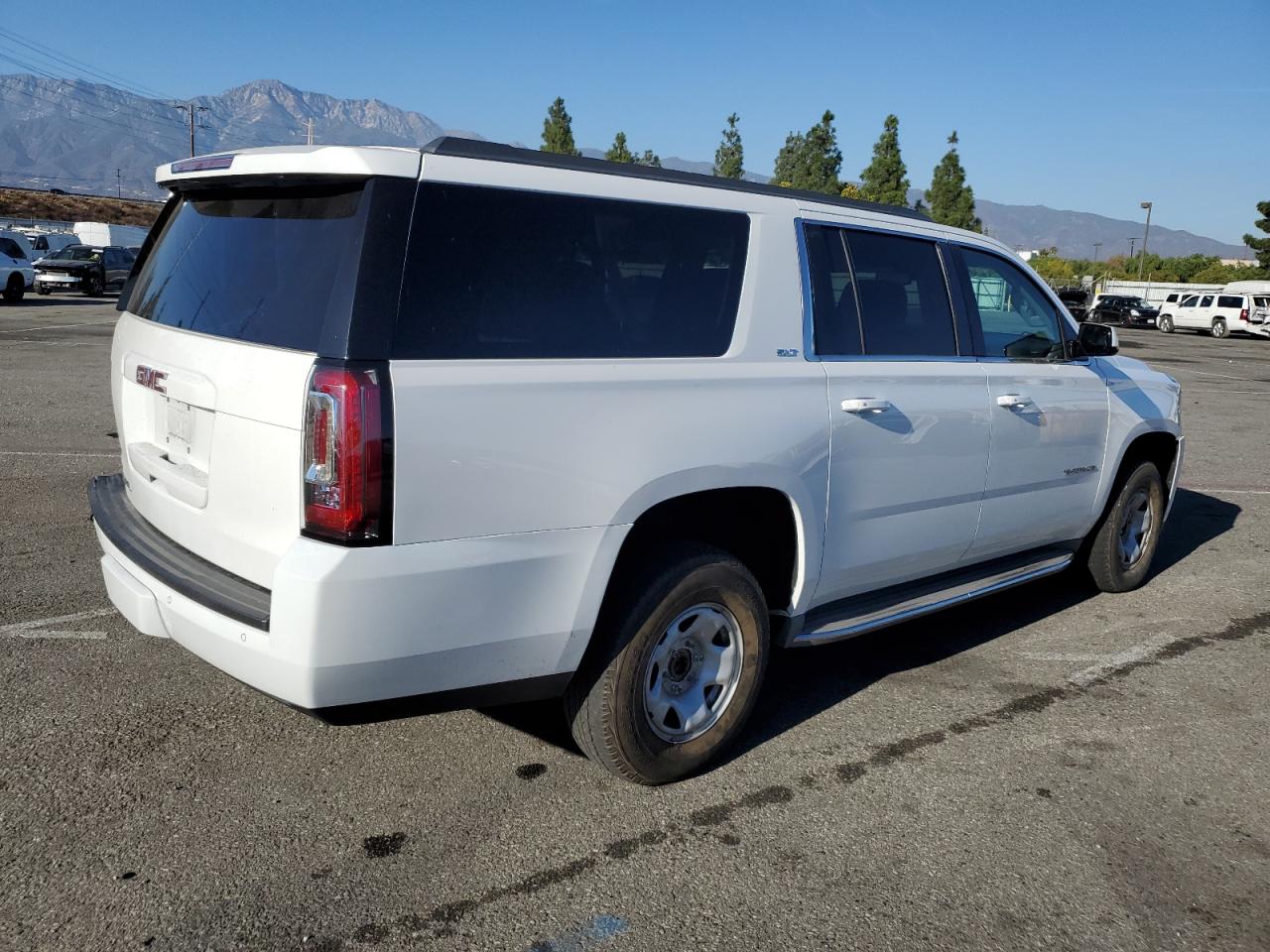 2015 GMC Yukon VIN 1GKS1HKC9FR196556 Copart auction photo, rear end damage thumbnail 3