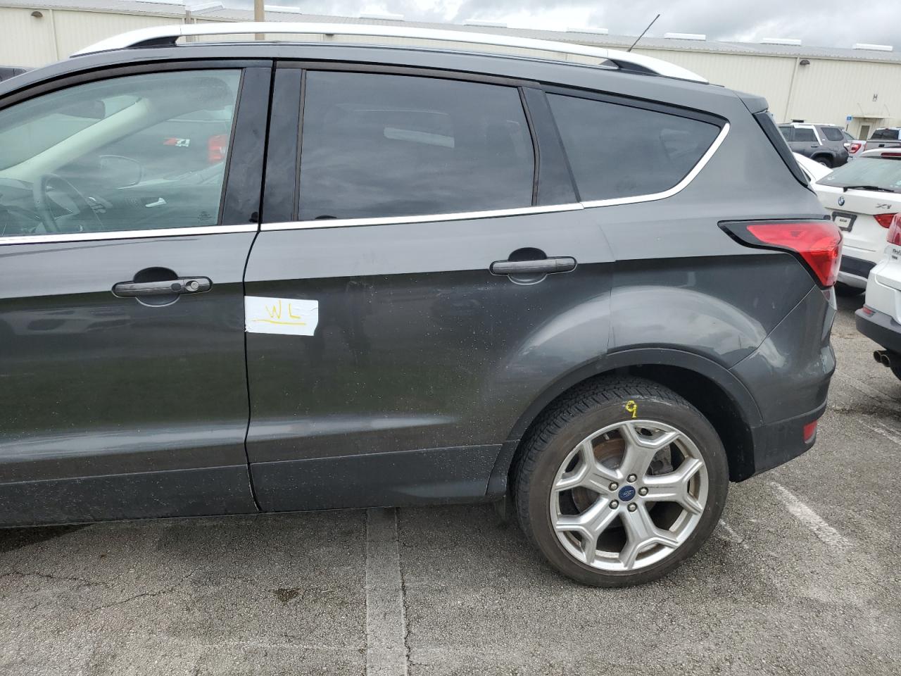 2019 Ford Escape VIN 1FMCU0J92KUB75212 Copart auction photo, water/flood damage thumbnail 13