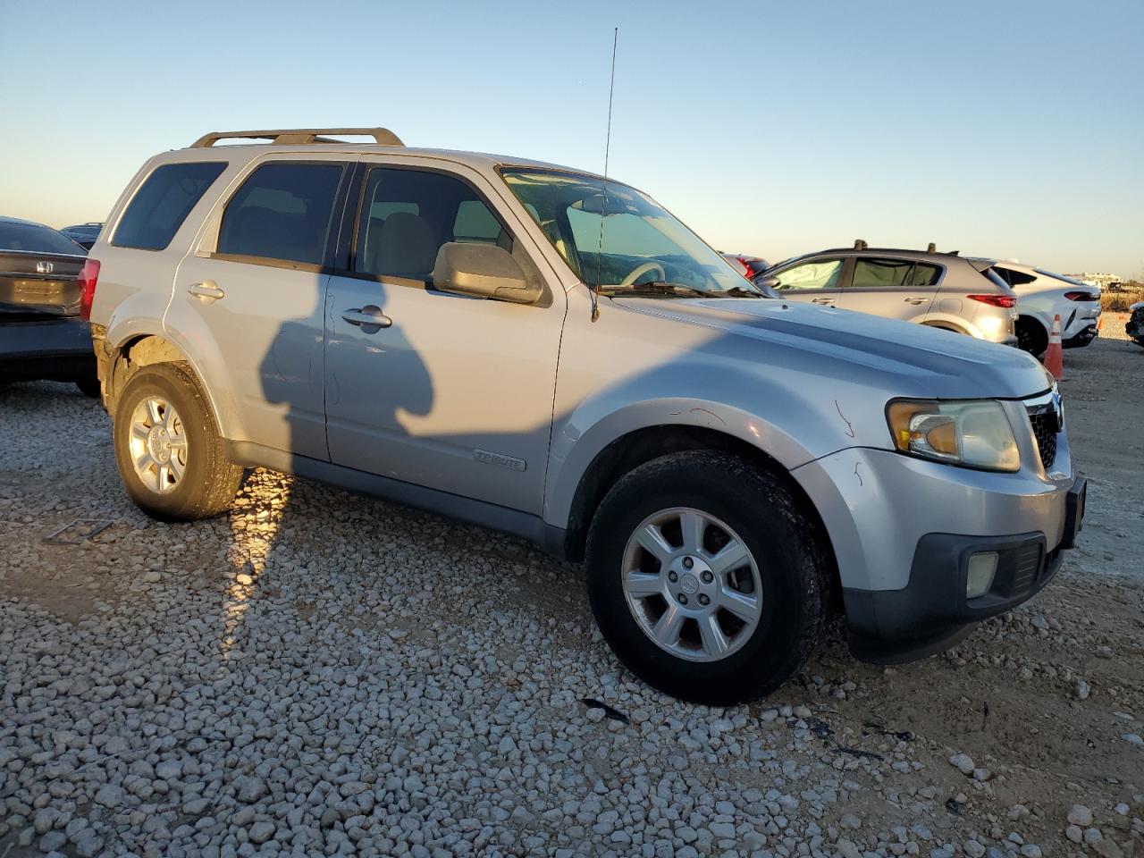 2009 Mazda Tribute VIN 4F2CZ02759KM06418 Copart auction photo, rear end / minor dent/scratches damage thumbnail 4