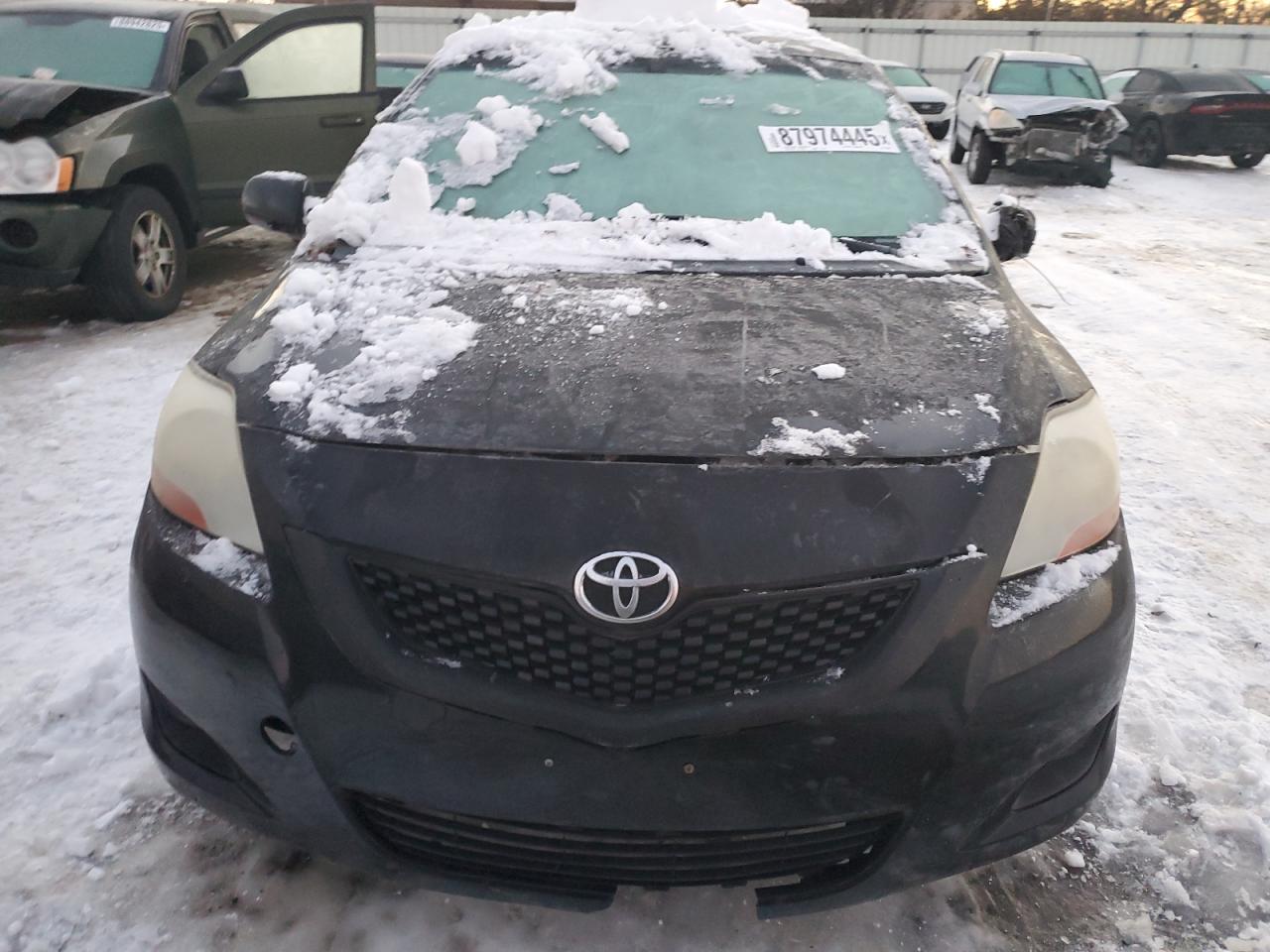 2010 Toyota Yaris VIN JTDBT4K35A1369544 Copart auction photo, front end / mechanical damage thumbnail 5