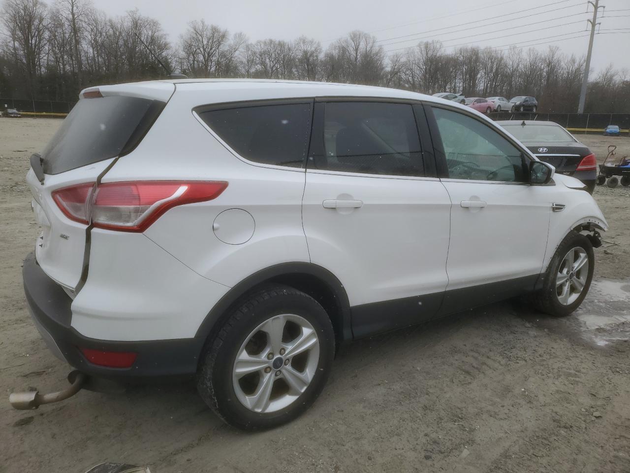 2016 Ford Escape VIN 1FMCU0G77GUB32935 Copart auction photo, front end / rear end damage thumbnail 3