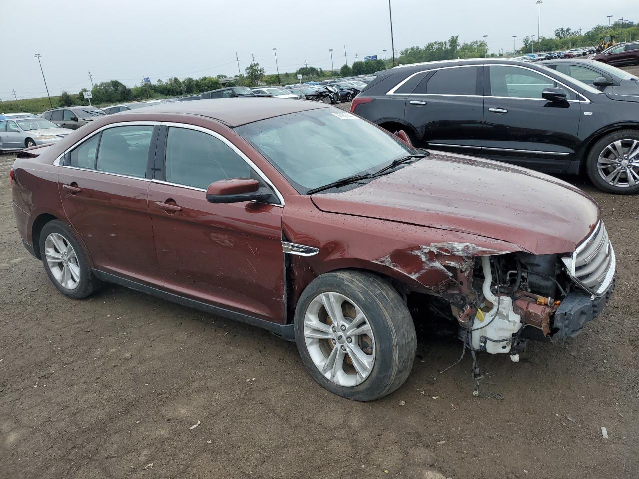 2015 Ford Taurus VIN 1FAHP2H87FG202750 Copart auction photo, front end / rear end damage thumbnail 4