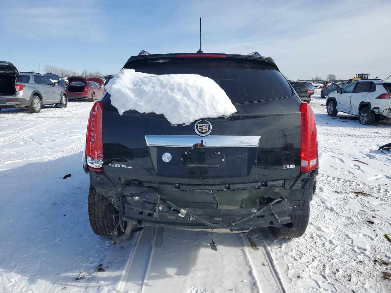 2015 Cadillac SRX VIN 3GYFNEE35FS610015 Copart auction photo, rear end damage thumbnail 6