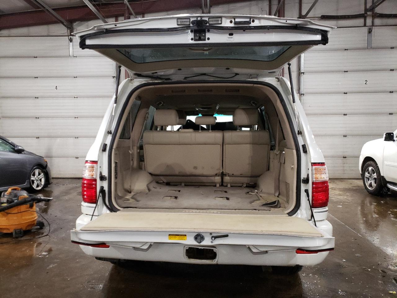 2005 Lexus LX VIN JTJHT00W853549527 Copart auction photo, side / minor dent/scratches damage thumbnail 6