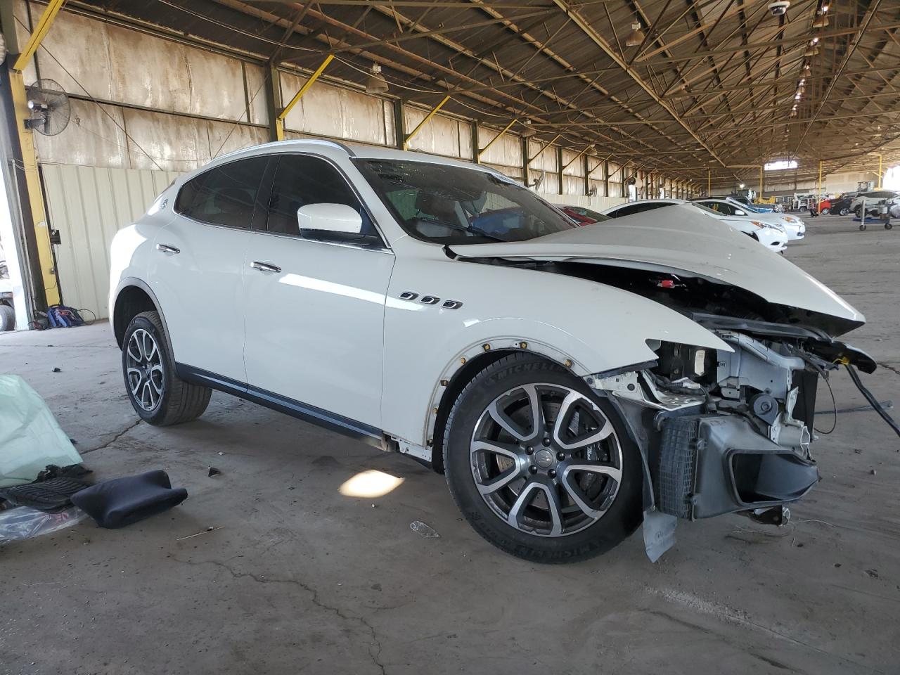 2017 Maserati Levante VIN ZN661YUA2HX242914 Copart auction photo, front end / side damage thumbnail 4