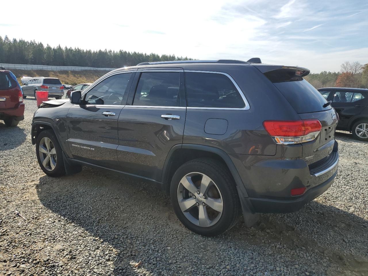 2015 Jeep Grand Cherokee VIN 1C4RJEBG1FC230990 Copart auction photo, front end / side damage thumbnail 2