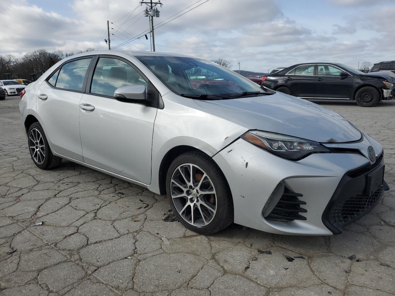 2017 Toyota Corolla VIN 5YFBURHE4HP588200 Copart auction photo, front end / side damage thumbnail 4