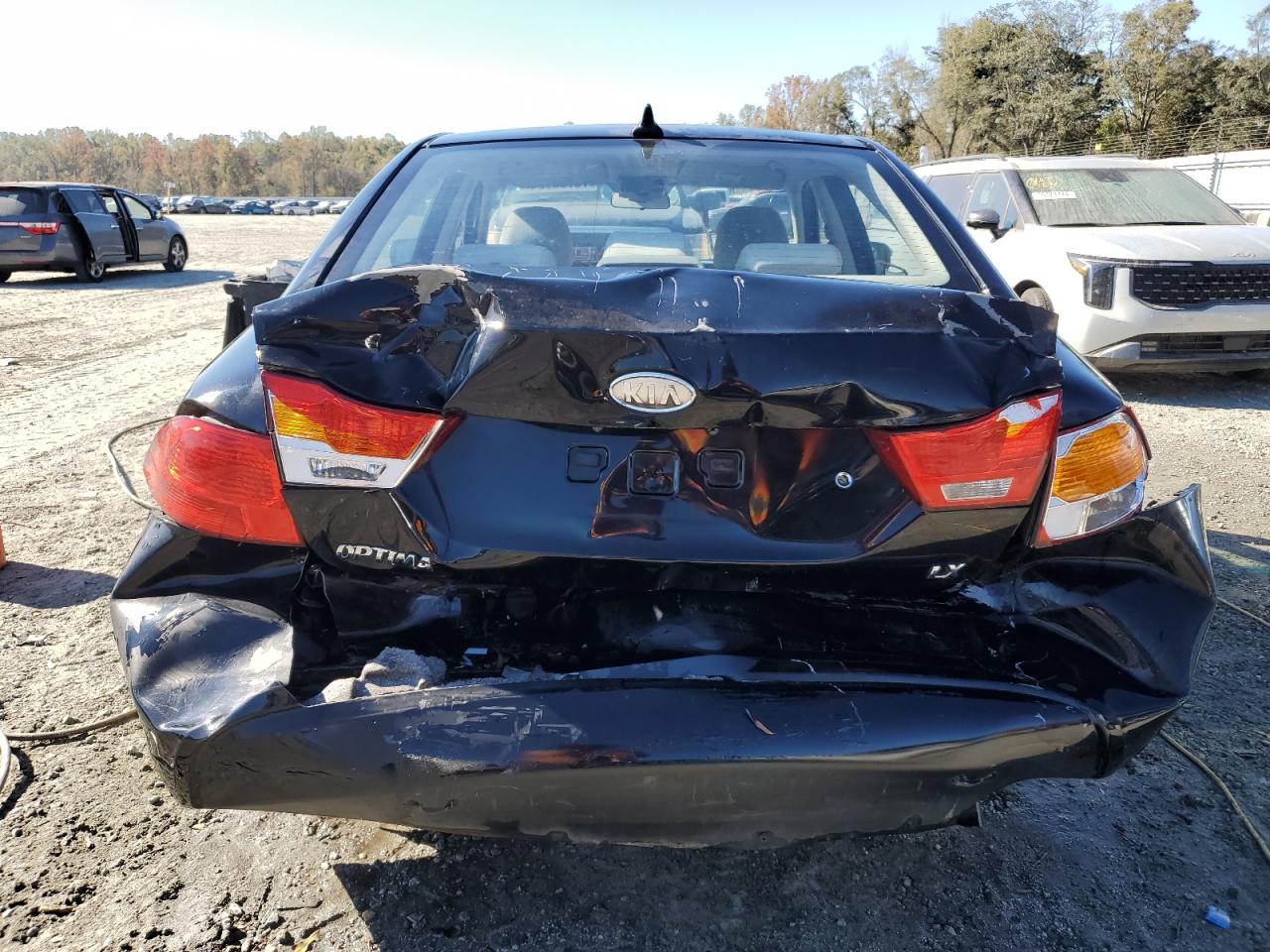 2009 KIA Optima VIN KNAGE228695360093 Copart auction photo, rear end / front end damage thumbnail 6
