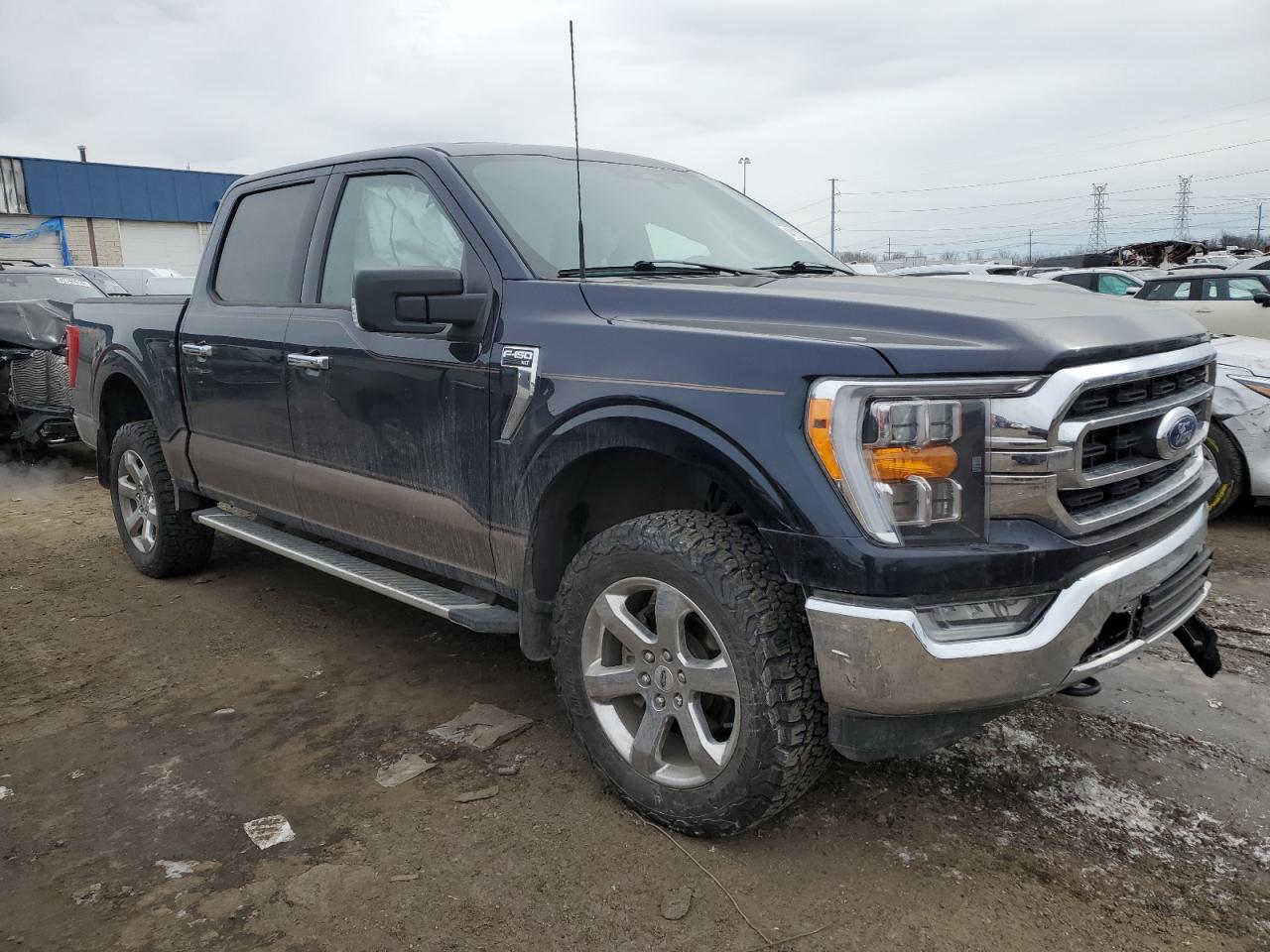 2022 Ford F-150 VIN 1FTFW1E54NFC23519 Copart auction photo, front end / side damage thumbnail 4