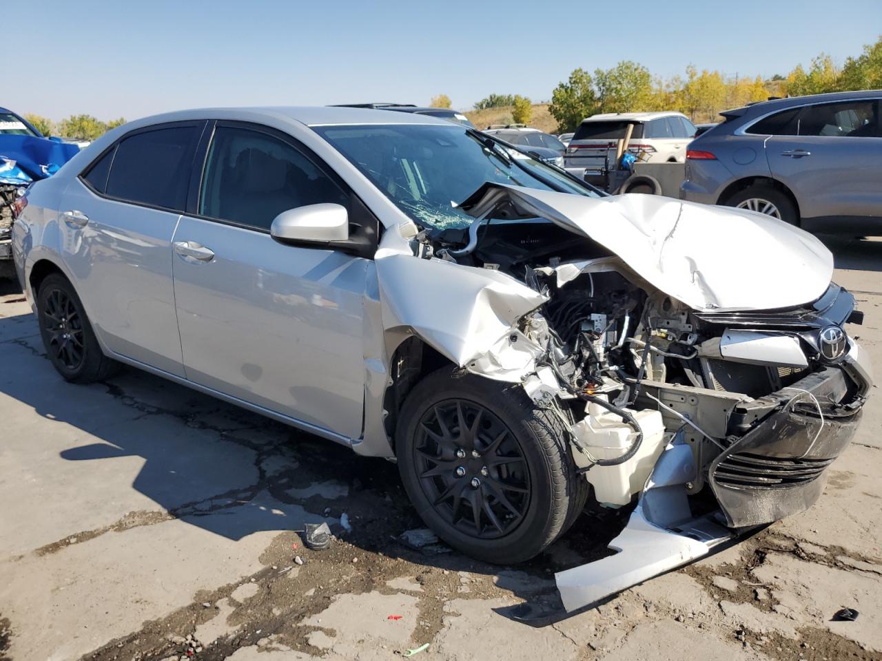 2017 Toyota Corolla VIN 5YFBURHE5HP629479 Copart auction photo, front end / side damage thumbnail 4