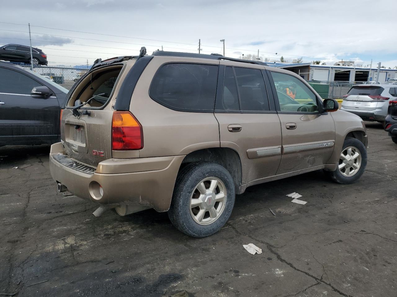 2002 GMC Envoy VIN 1GKDT13SX22353269 Copart auction photo, rollover damage thumbnail 3