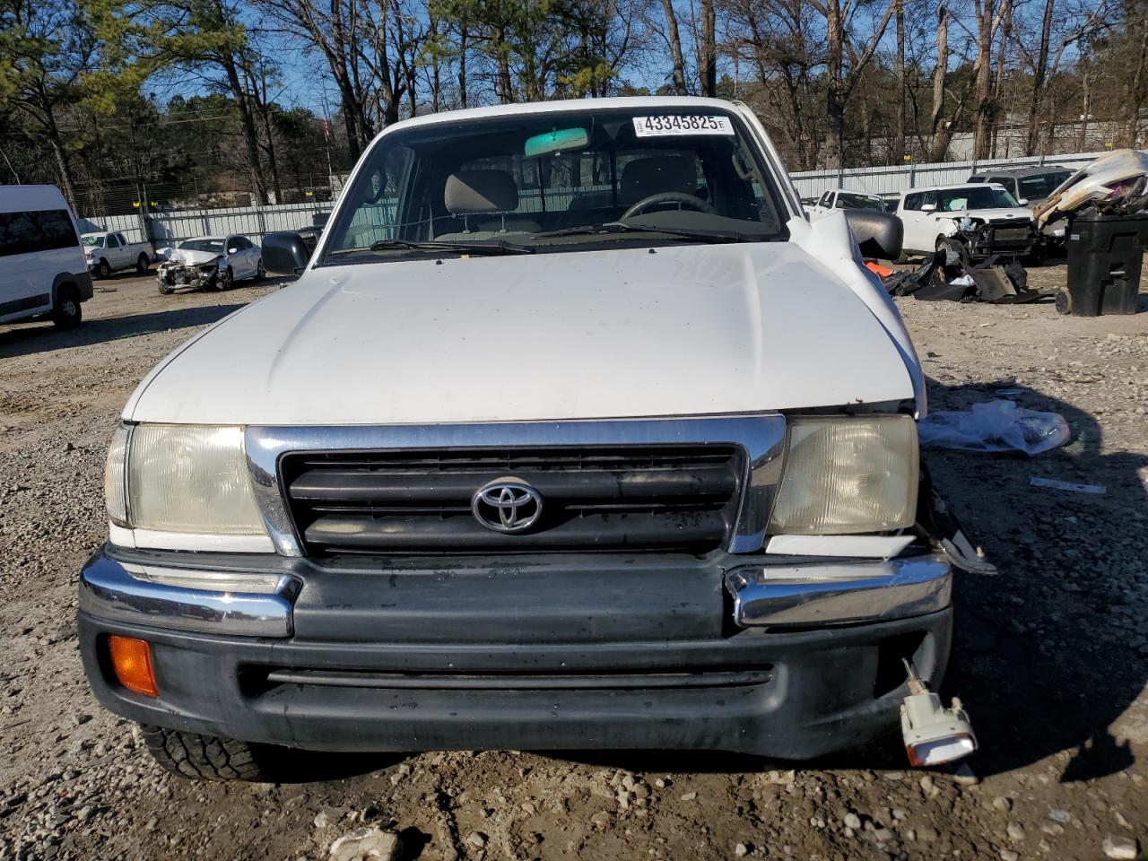 1999 Toyota Tacoma VIN 4TAWM72N0XZ423582 Copart auction photo, all over damage thumbnail 5