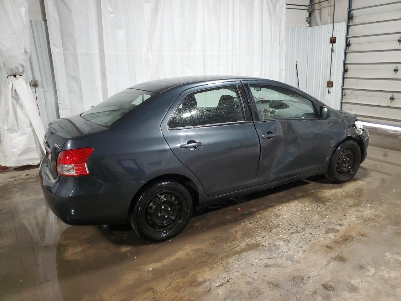 2009 Toyota Yaris VIN JTDBT903094042849 Copart auction photo, side / front end damage thumbnail 3