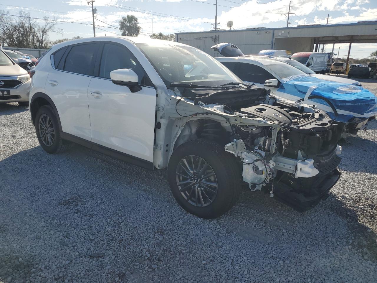 2020 Mazda CX-5 VIN JM3KFACM6L1700106 Copart auction photo, front end damage thumbnail 4