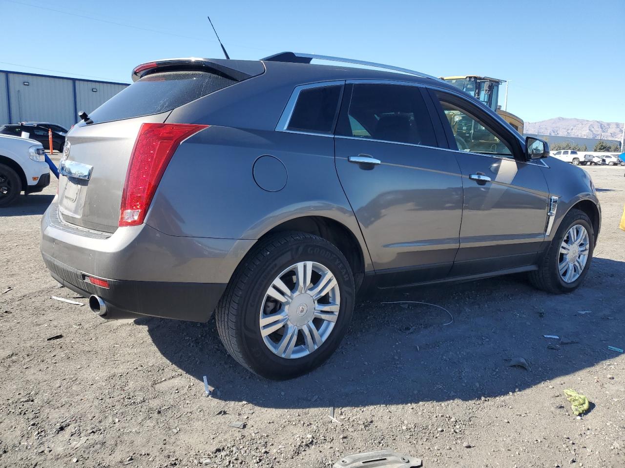 2011 Cadillac SRX VIN 3GYFNAEYXBS555074 Copart auction photo, front end damage thumbnail 3