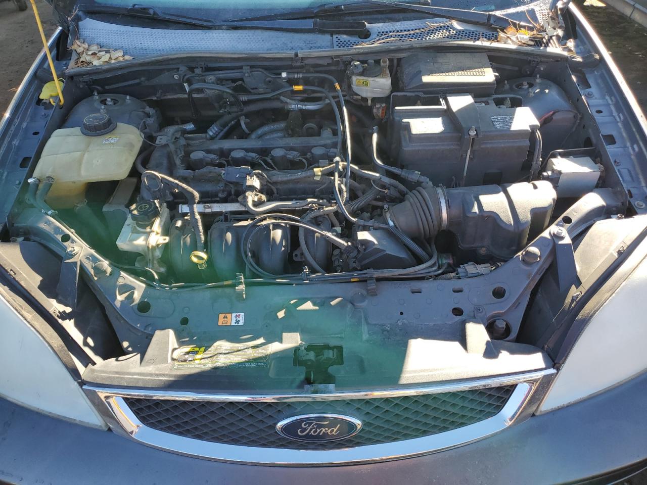 2007 Ford Focus VIN 1FAHP31N77W324635 Copart auction photo, stripped damage thumbnail 12