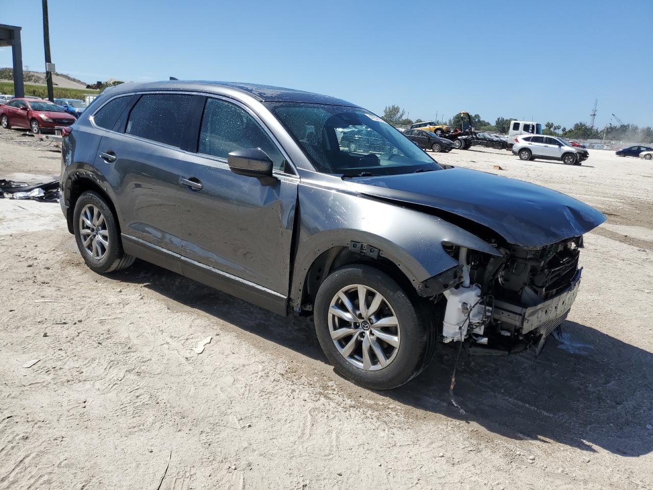 2019 Mazda CX-9 VIN JM3TCACY4K0330567 Copart auction photo, front end / minor dent/scratches damage thumbnail 4