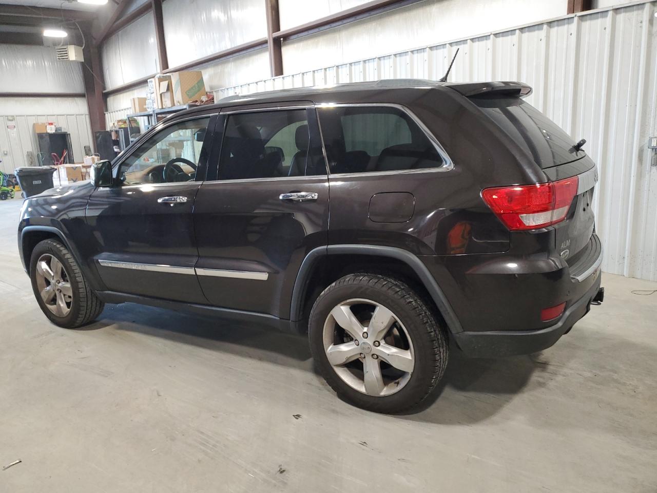 2012 Jeep Grand Cherokee VIN 1C4RJECT5CC277561 Copart auction photo, side damage thumbnail 2