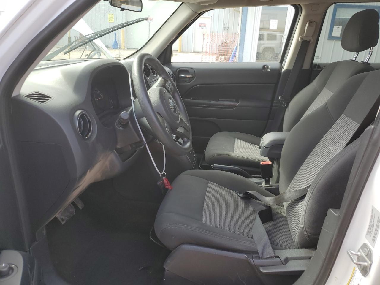 2015 Jeep Liberty (Patriot) VIN 1C4NJPBA0FD333852 Copart auction photo, rollover damage thumbnail 7