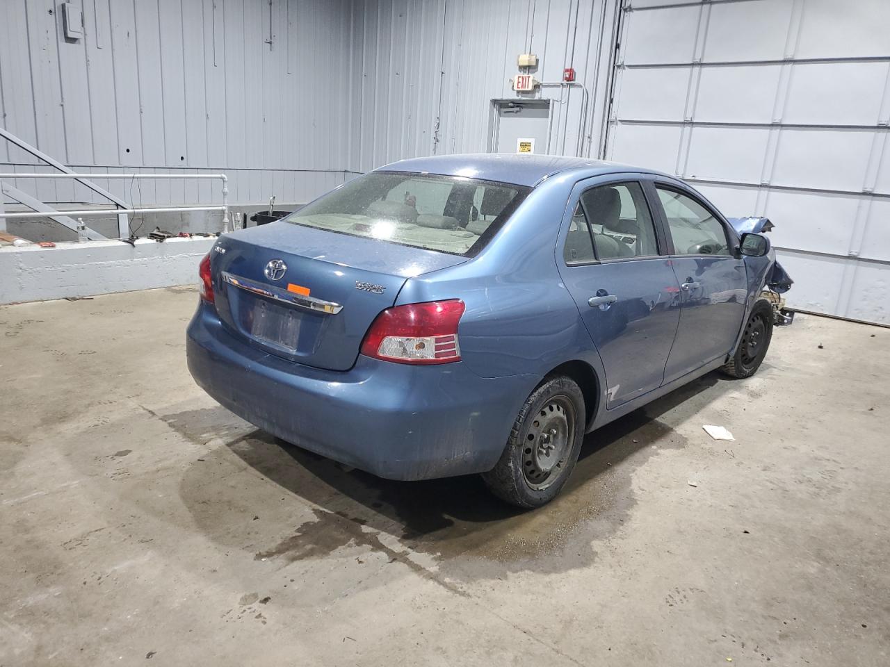2009 Toyota Yaris VIN JTDBT903094047243 Copart auction photo, front end / mechanical damage thumbnail 3