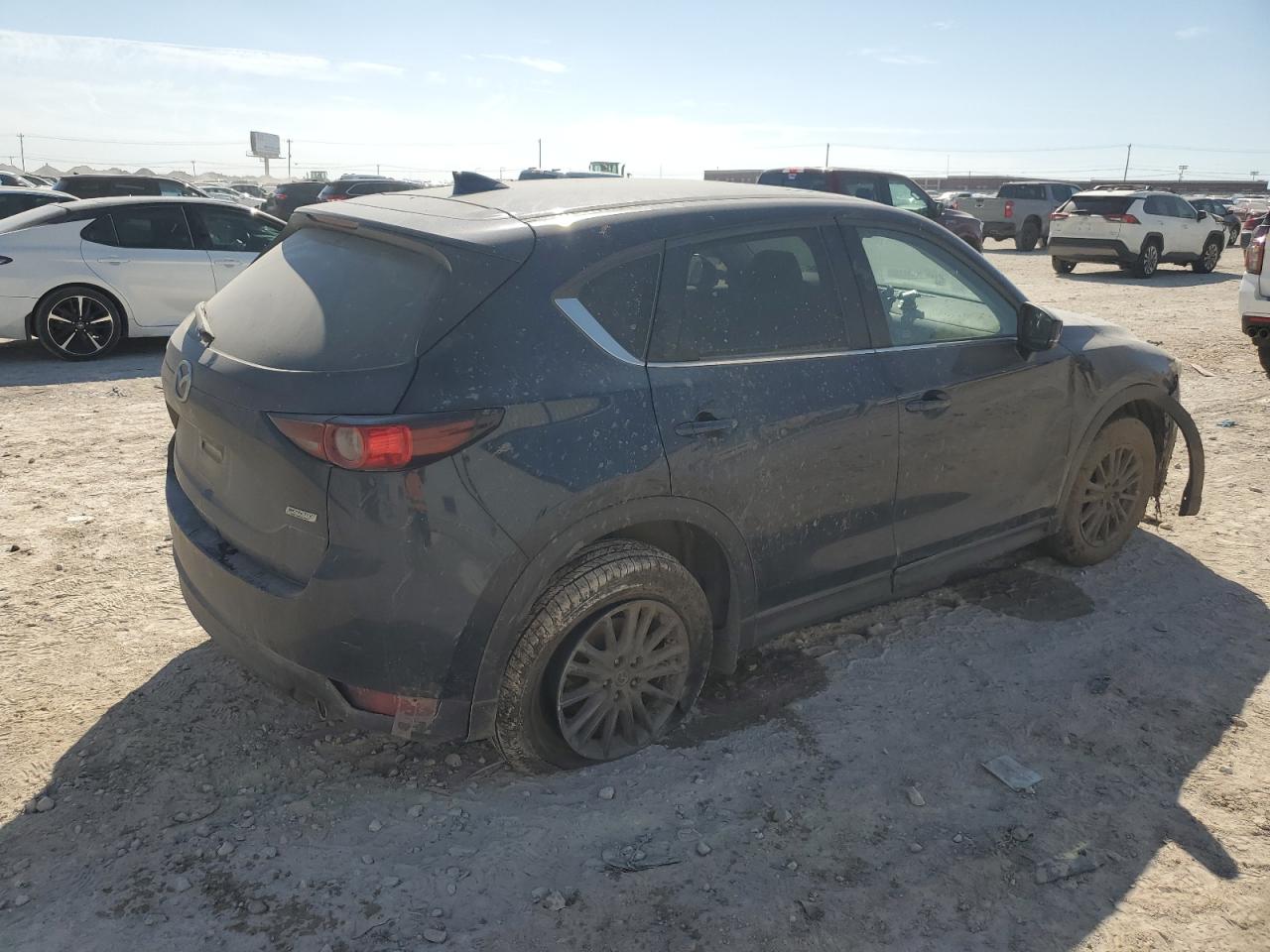 2019 Mazda CX-5 VIN JM3KFBCM7K0551604 Copart auction photo, front end / undercarriage damage thumbnail 3