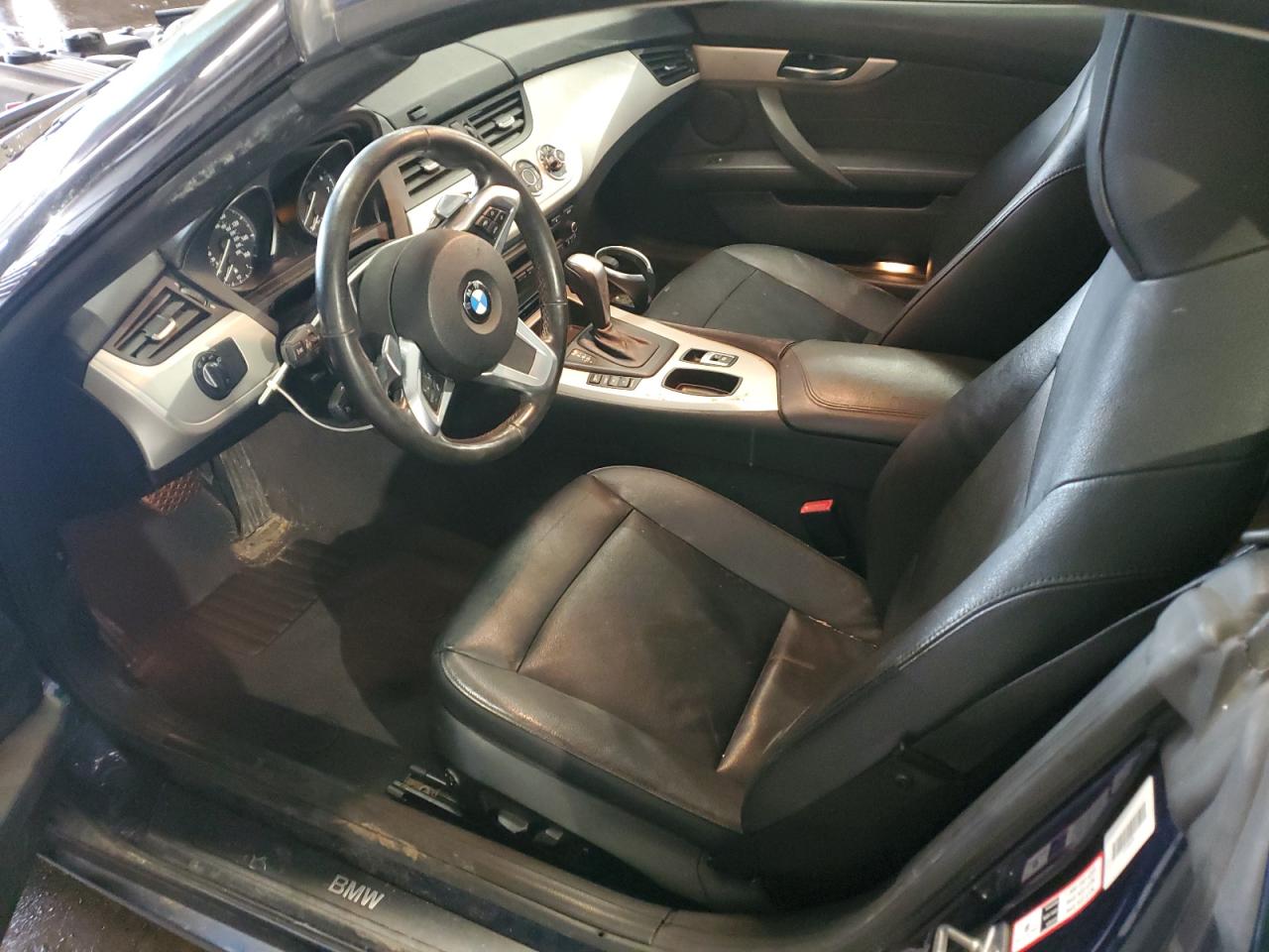 2011 BMW Z4 VIN WBALM5C52BE380399 Copart auction photo, front end damage thumbnail 7
