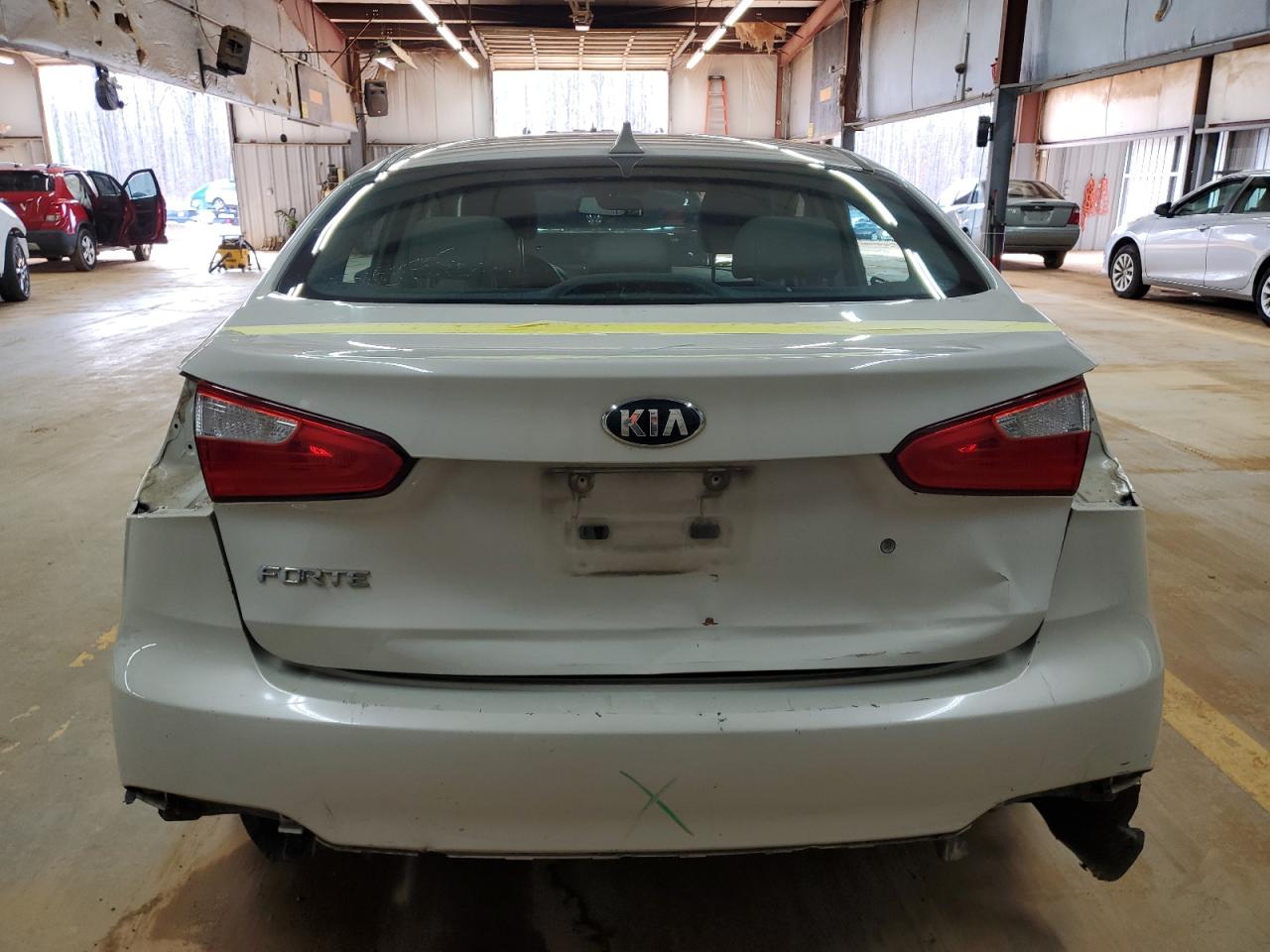 2015 KIA Forte VIN KNAFK4A69F5335393 Copart auction photo, rear end damage thumbnail 6